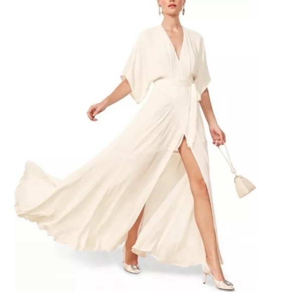 Reformation Dresses & Skirts - Reformation Ivory Winslow Maxi Wrap
Dress, NWT
Reformation
Size: M
$179 $398